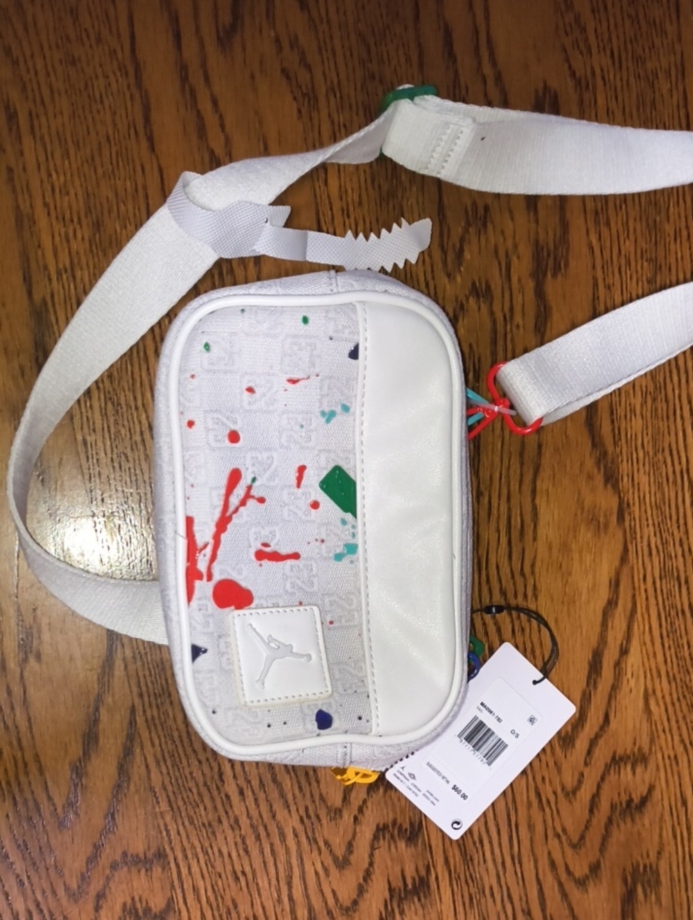 Jordan White Crossbody Bag with Red and Green Paint-Splash Accents